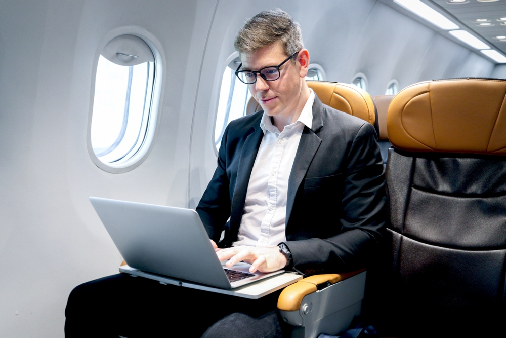 Busy,Businessman,Working,On,Laptop,Computer,During,Sitting,In,Comfortable