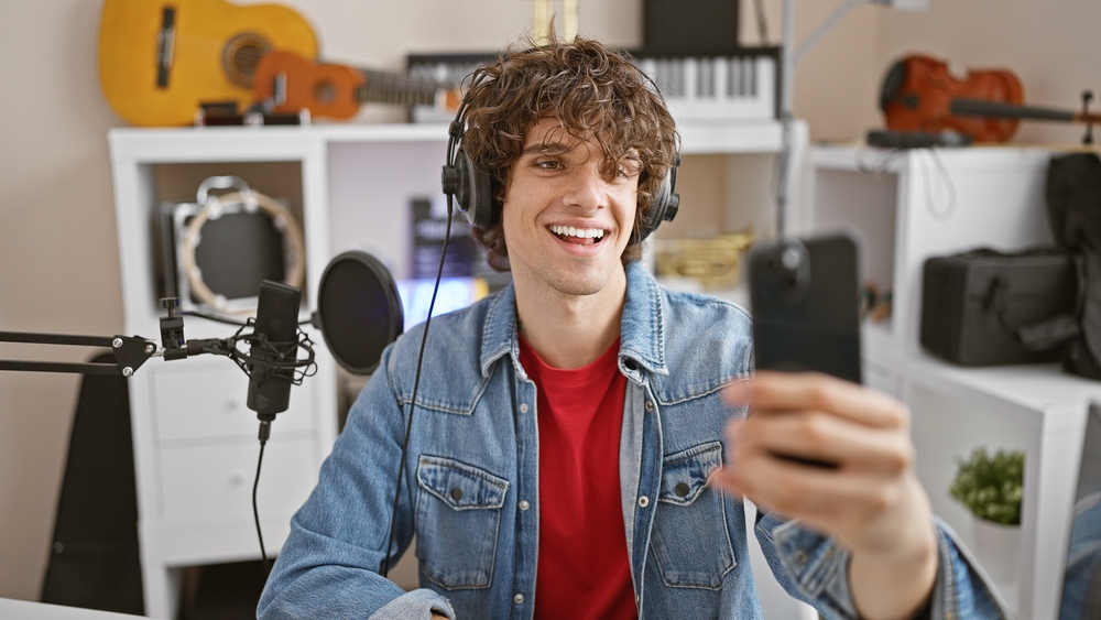 A,Handsome,Man,With,Curly,Hair,Taking,A,Selfie,In